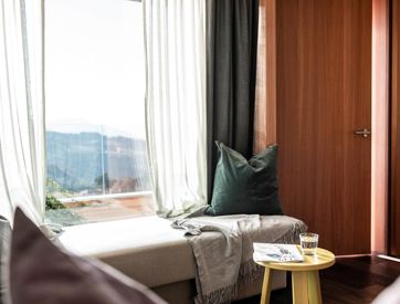 The living area with a view on the mountains of one of the apartments